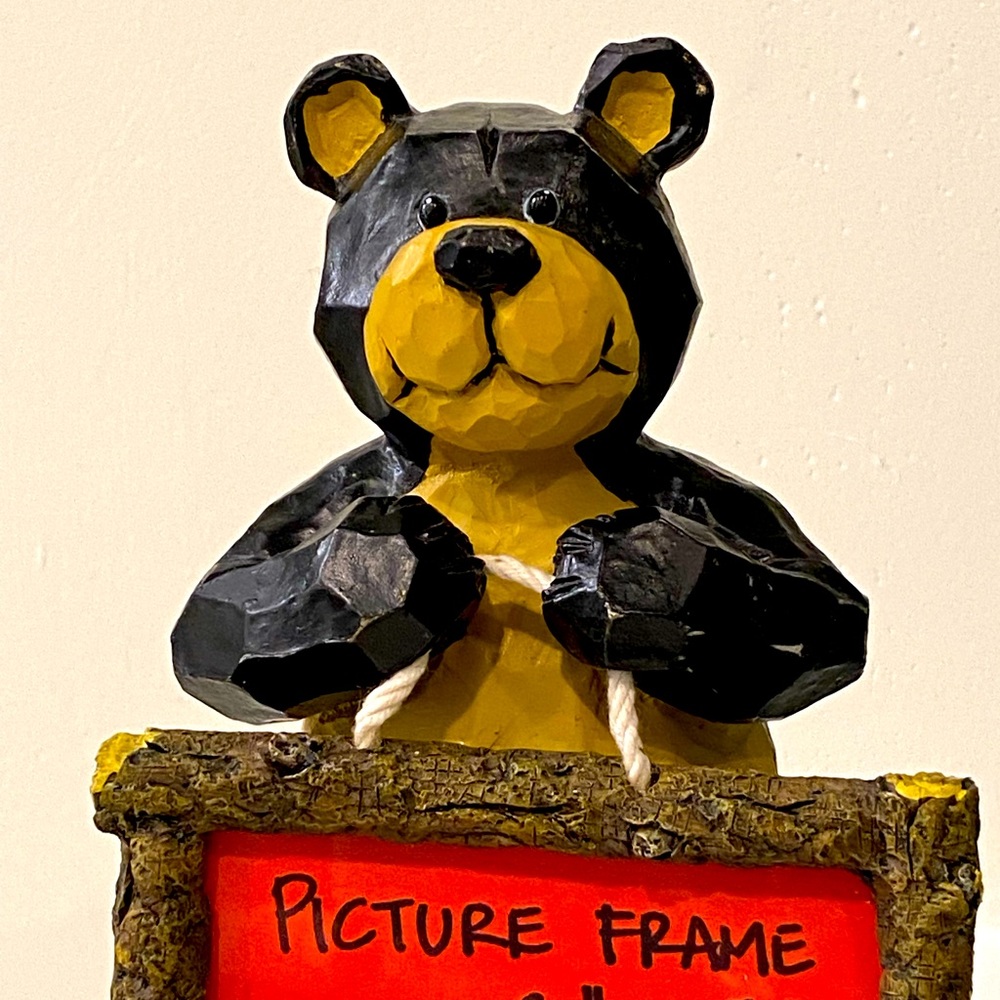 Wooden bear holding a picture frame, photo size 1-9/16” x 2-58”